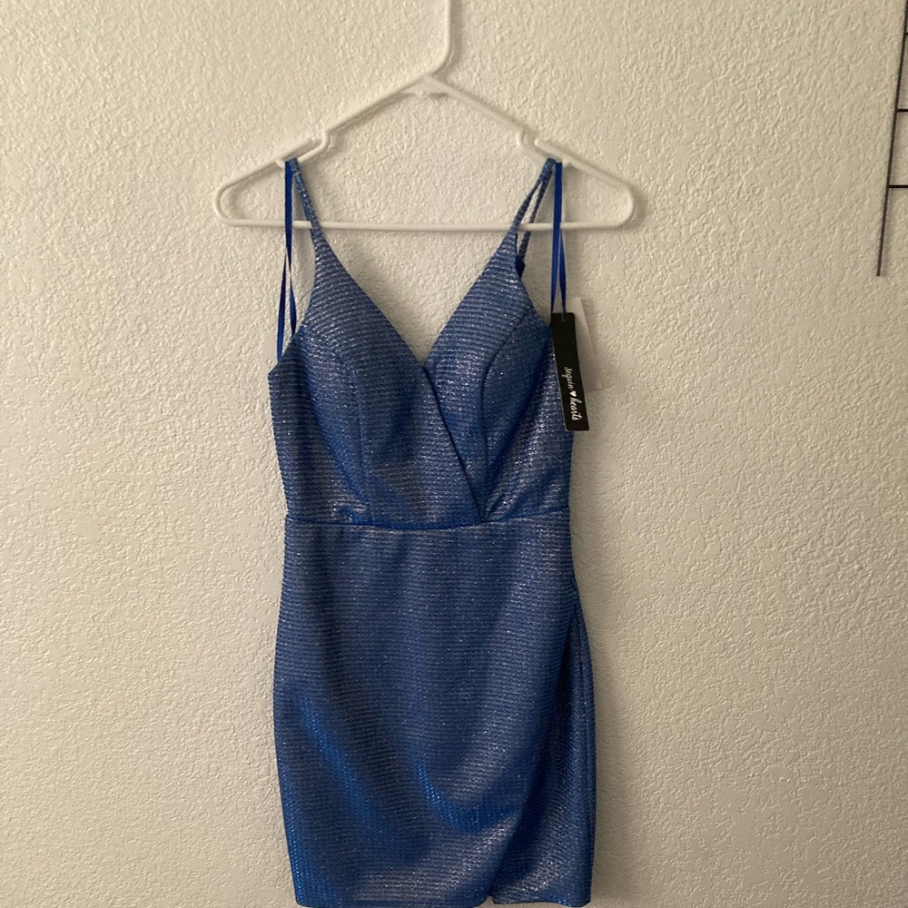 3 Formal dresses! From Dillards and Windsor.